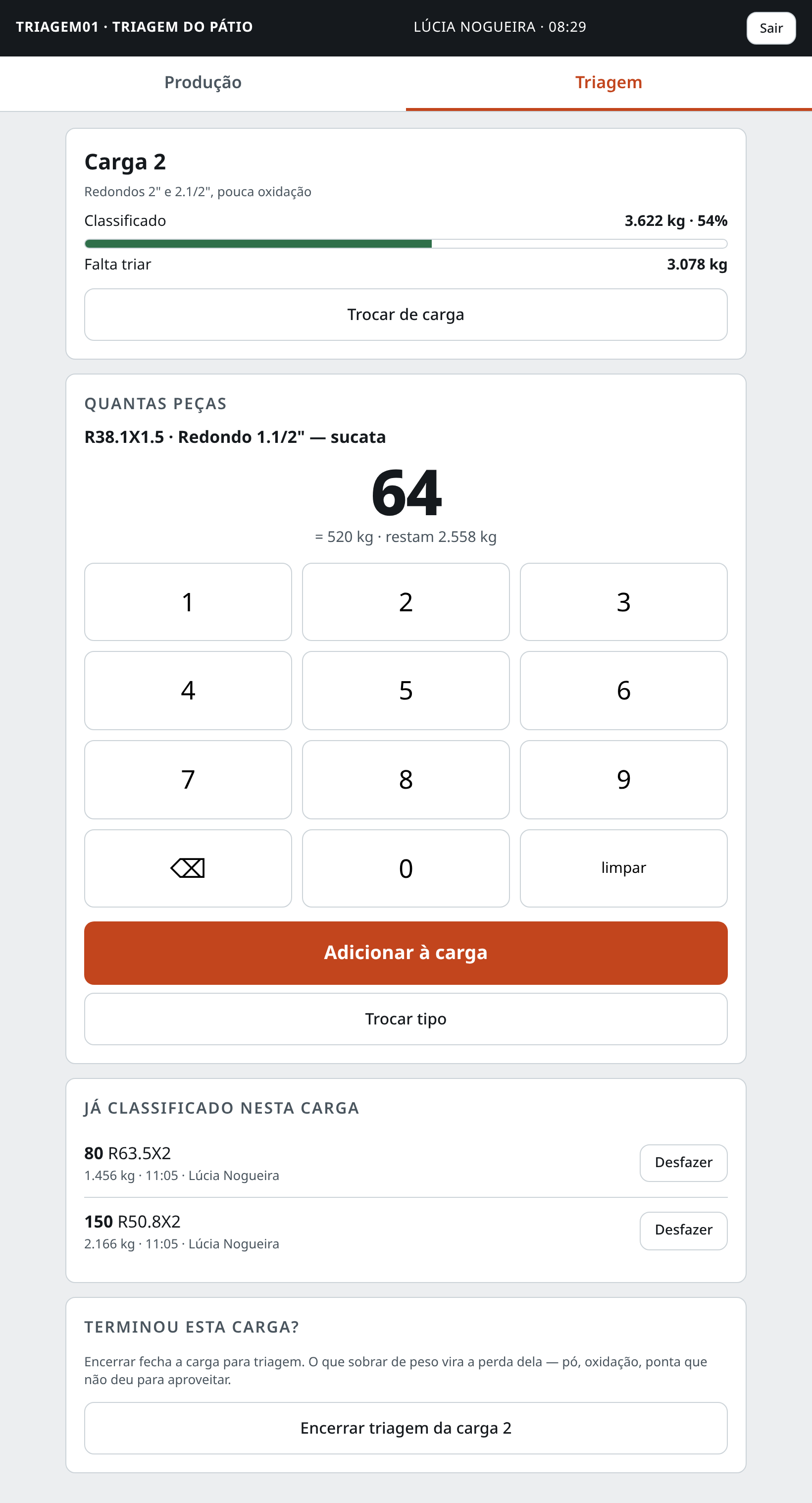 Teclado numérico da triagem mostrando 64 peças e o peso correspondente